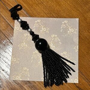 Black Beaded Tassel Clip